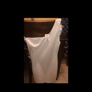 A white/cream one shoulder dress